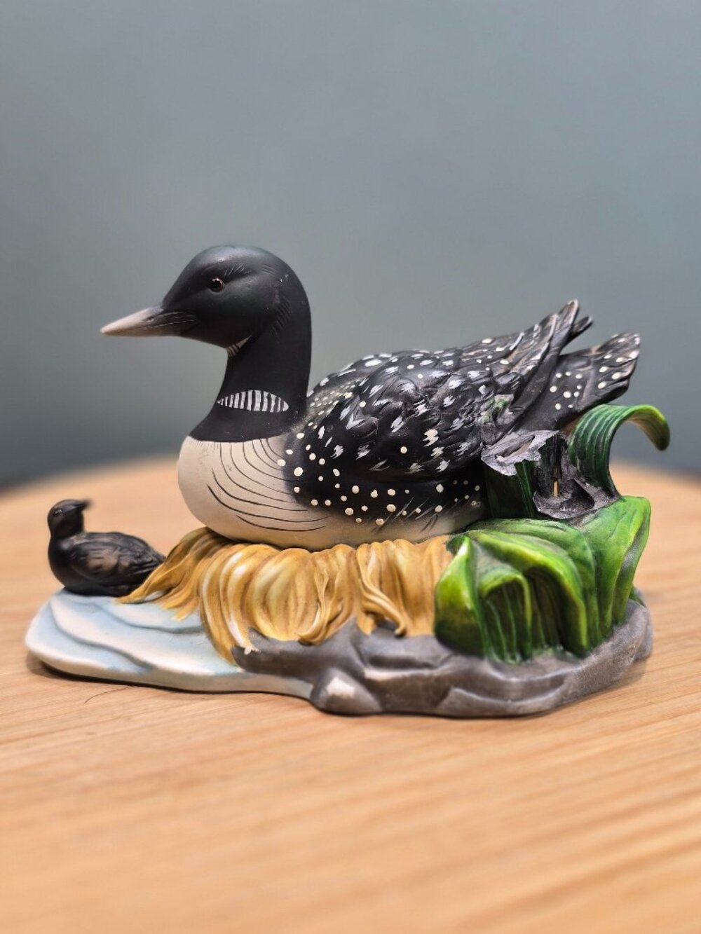 Vintage Beautiful Ceramic Loon Figurine with a Chick Nestled in a Marshy Habitat